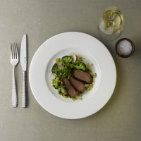 OVERHEAD- PROFILE PLATE WITH BAMBOO CUTLERY. BEEF AND PEA PUREE 2